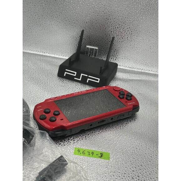 Red and black psp 3000 w/charger adapter, new battery & has glass screen lens - Picture 2 of 9